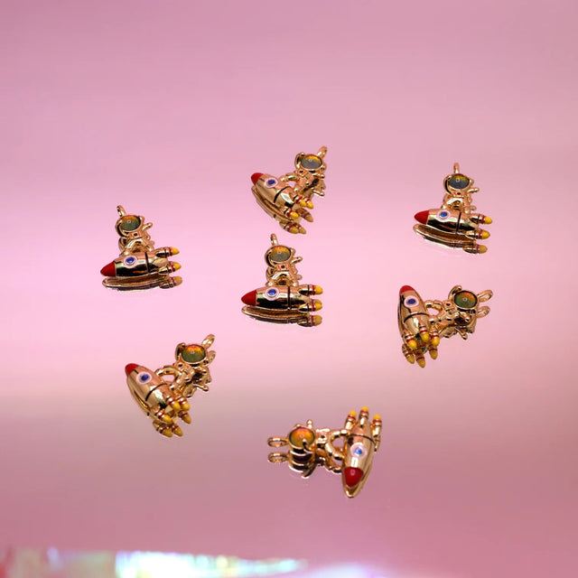 Flying astronaut (orange-green) | Atelier Jean - Atelier Jean - wonder & melon