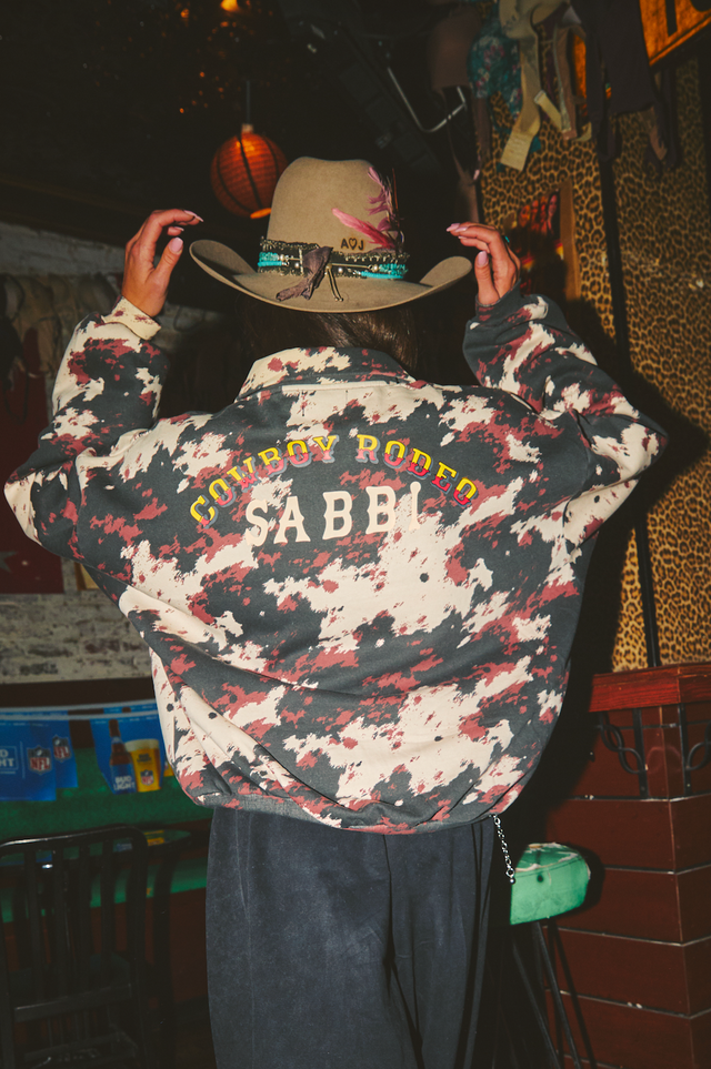 SABBI | The Cowprint Collared Sweater