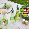 Claude olie- en azijnset groen op tafel