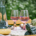 Claude wijnglazen roze op tafel